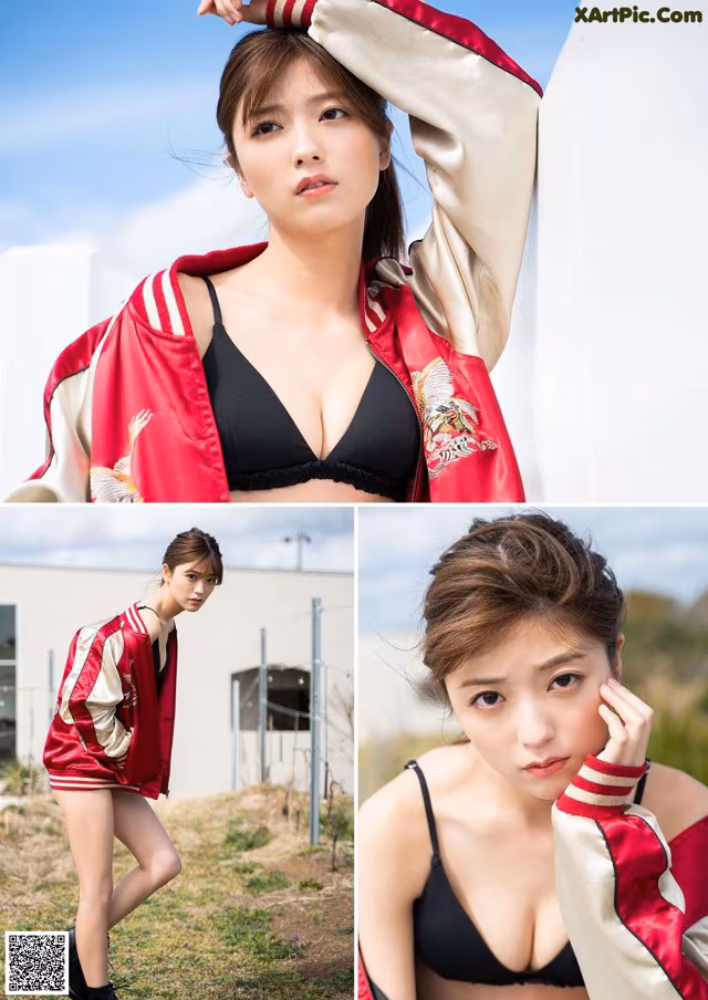 A woman in a red and white jacket posing for a picture.