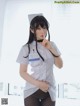 A woman dressed as a nurse posing for a picture.